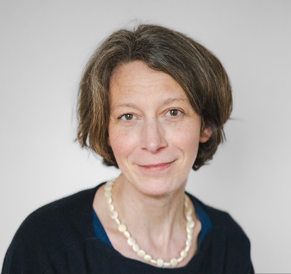 Headshot of Capucine Korenberg, a therapist, counsellor, psychotherapist based in London smiling gently.